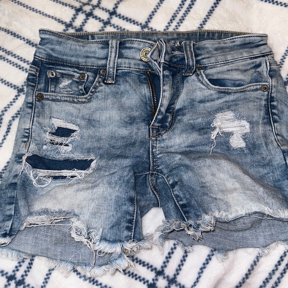 patched ripped jean shorts